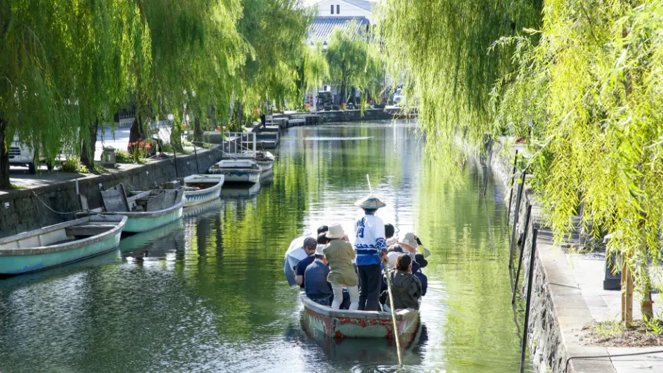 Cruise Yanagawa's waterways in a tranquil journey through a traditional Japanese village